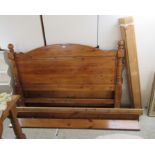 A pine framed bed with mattress the headboard 66''w BSR