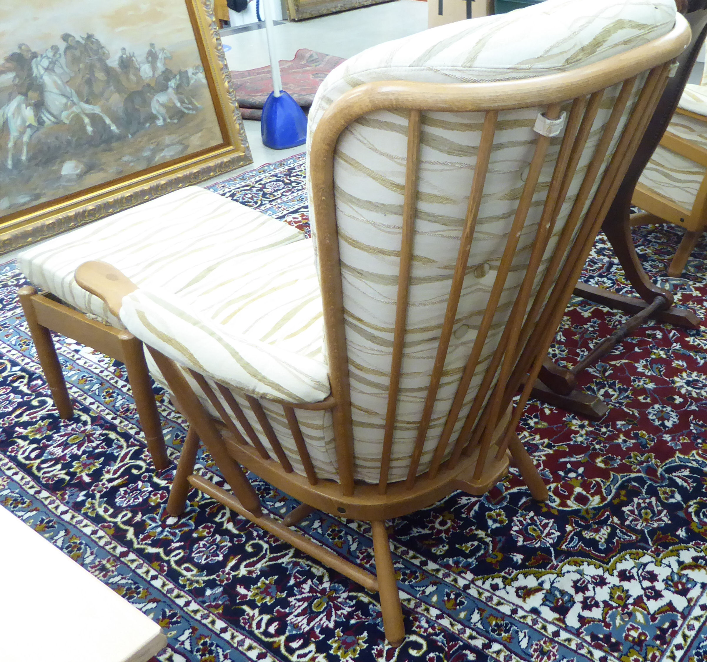 An Ercol beech framed high hoop and spindled back, enclosed arm chair, - Image 4 of 5