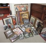 A varied collection of World War II German military related framed pictures,