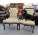 A pair of modern Victorian style stained beech spoonback nursing chairs,