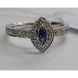 An 18ct white gold sapphire and diamond set ring 11