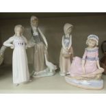 Three Nao porcelain and Spanish porcelain figures: to include a young woman carrying a basket of