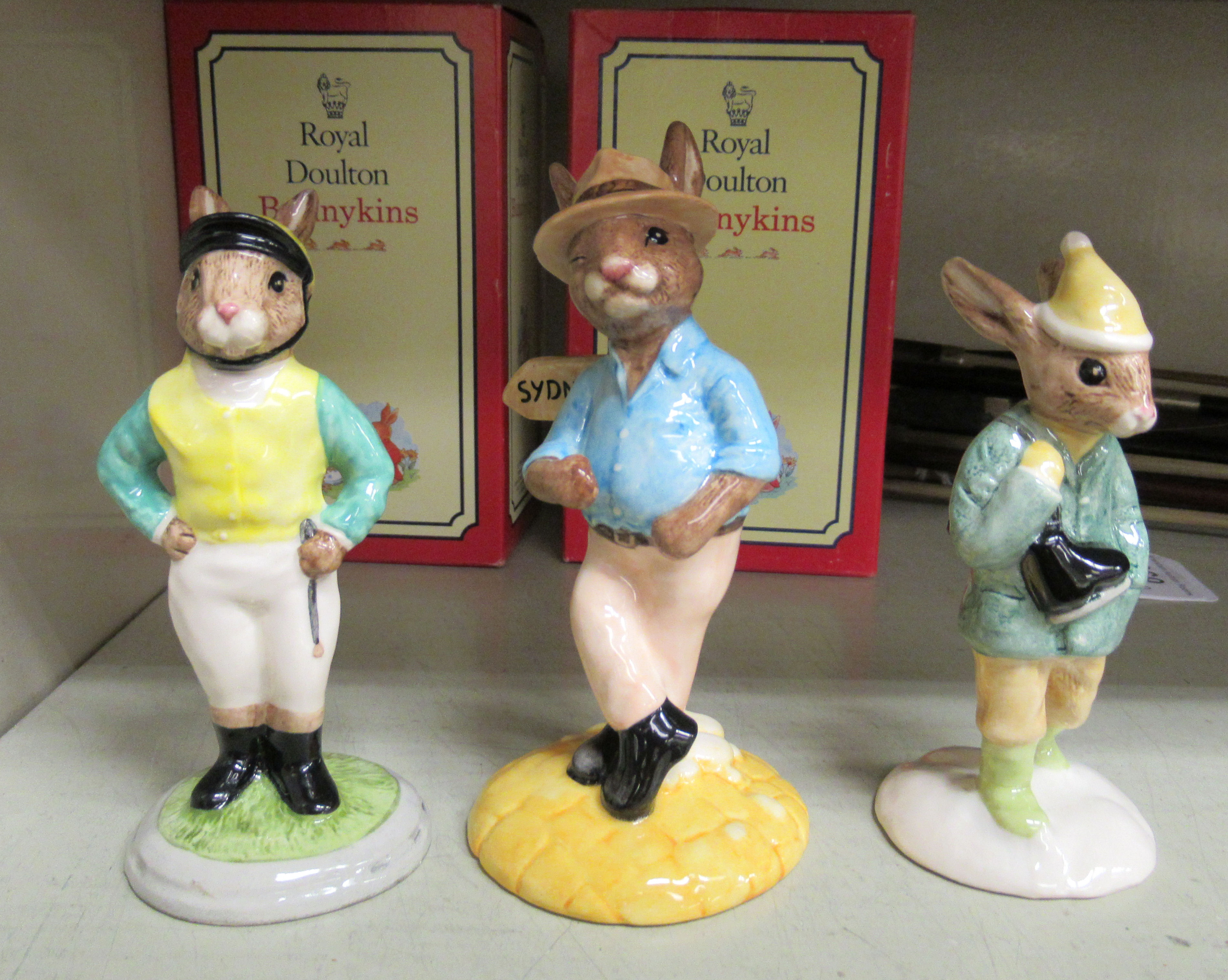 Three in the series of Royal Doulton china figures, viz. 'Jockey Bunnykins' 4.