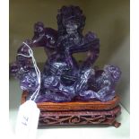 A 20thC Chinese amethyst carving of Dogs of Fo,
