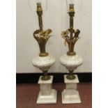 A pair of modern table lamps, each comprising a naturalistically fashioned gilt metal,