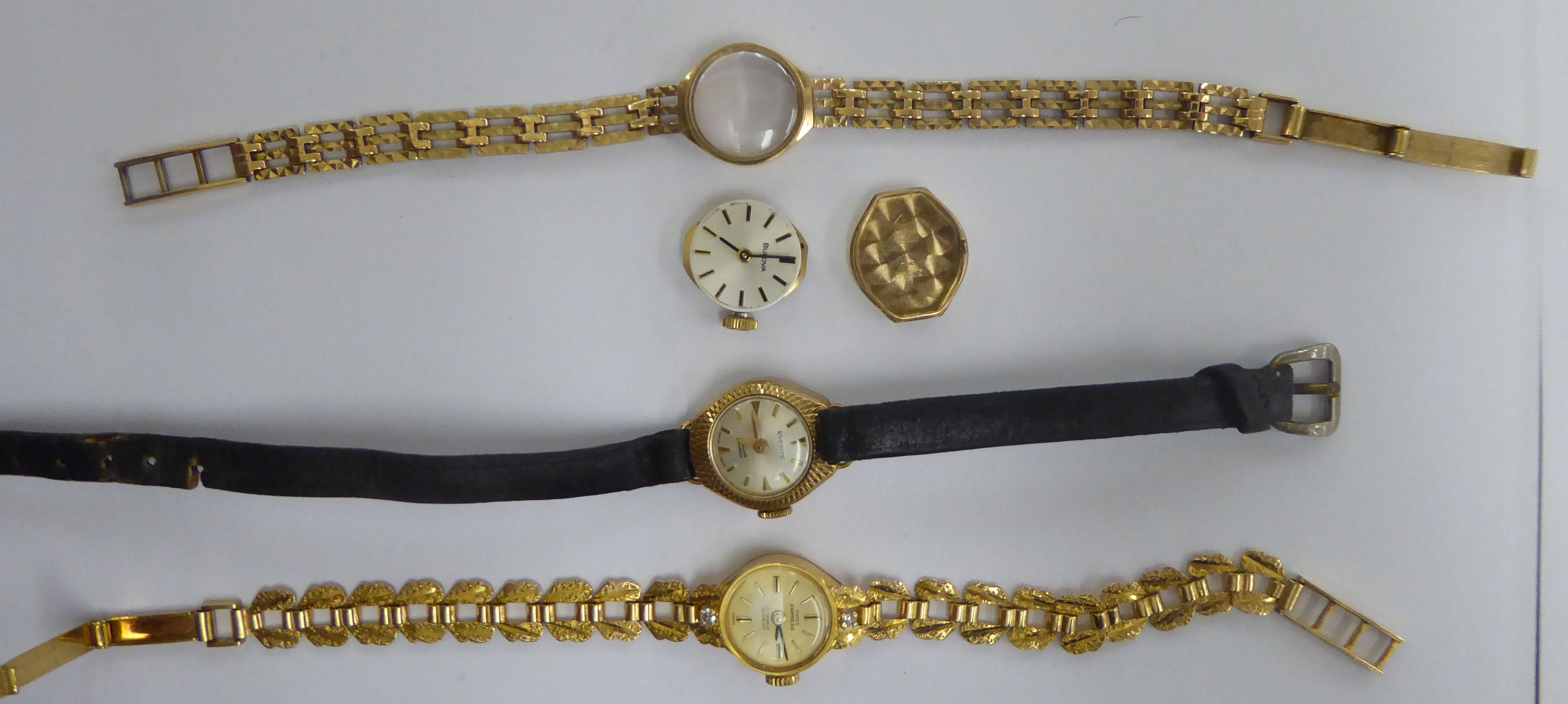 Three lady's watches: to include a 9ct gold cased example 11 - Image 2 of 2