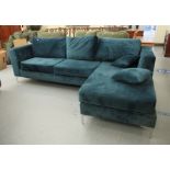 A modern blue fabric upholstered L-shaped settee with a cushioned back,