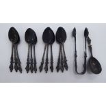 A set of twelve silver apostle spoons with a matching pair of sugar tongs;