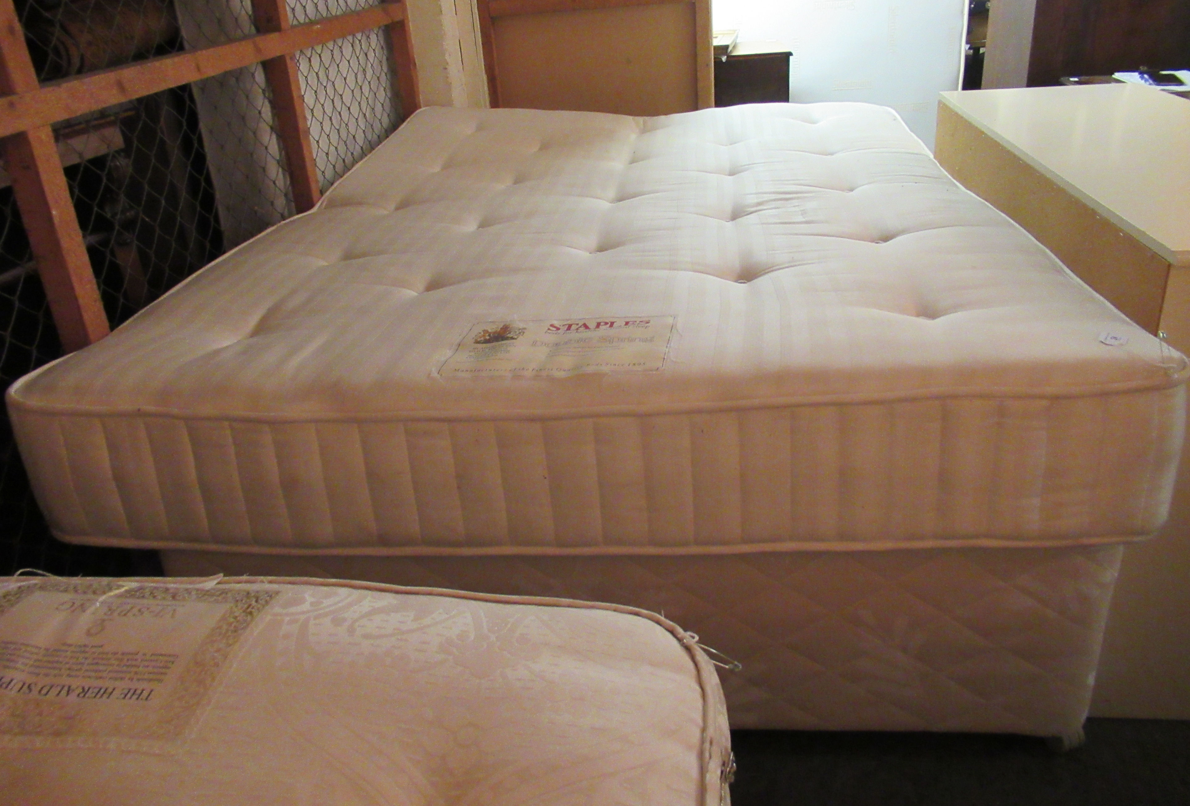 A Staples Double Spring double mattress,