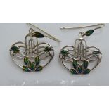 A pair of Art Nouveau inspired silver and coloured enamel earrings 11
