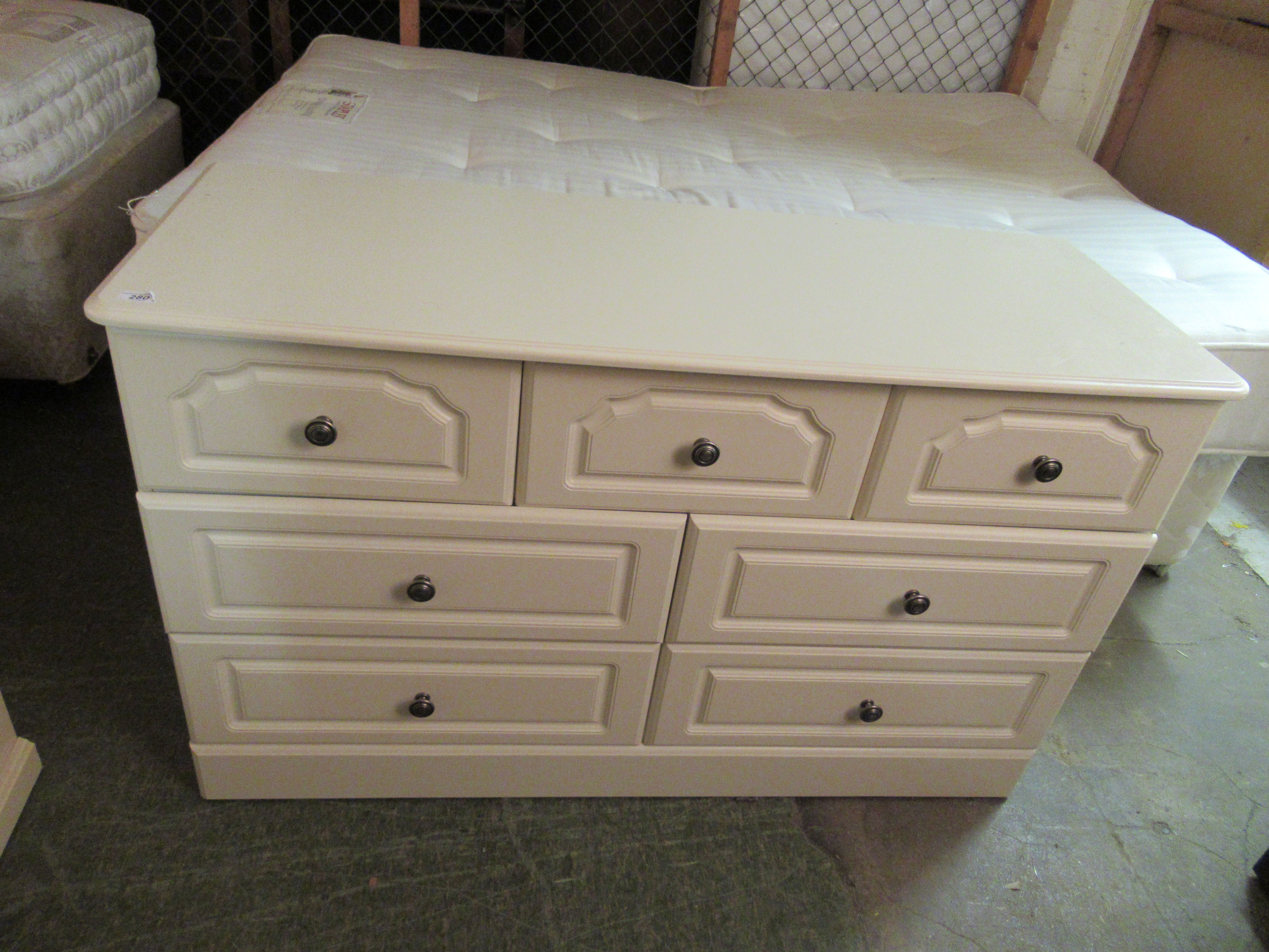 A pair of modern cream coloured laminated four drawer bedside chests 27''h 21''w; - Image 3 of 3