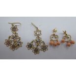 A pair of 9ct bi-coloured gold pendant earrings; and a pair of 9ct gold earrings,