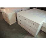 A pair of modern cream coloured laminated four drawer bedside chests 27''h 21''w;