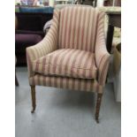 A modern striped patterned fabric upholstered armchair,