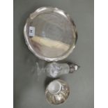 A Sterling silver waiter stamped Mexico 9''dia; a silver capped glass caster London marks;