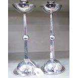 A pair of Arts & Crafts inspired (possibly) European silver plated candlesticks with flower petal