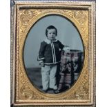 [ANONYMOUS] Standing portrait of a young boy, together with 2 images of boys sitting In a