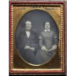 [ANONYMOUS] Portrait of man with a younger wifeFine daguerreotype with the young woman holding