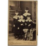 [ANONYMOUS] Posing for the photograph, girls wearing lace collars, soldier with family and