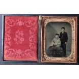 [ANONYMOUS] Portrait of young couple, the man standing and the woman sitting, double portrait of