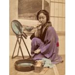 [JAPAN, unidentified 19th-century photographer] A small concertina album of 50 mounted hand-