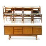 A mid 20th Century teak eight-piece dining room suite