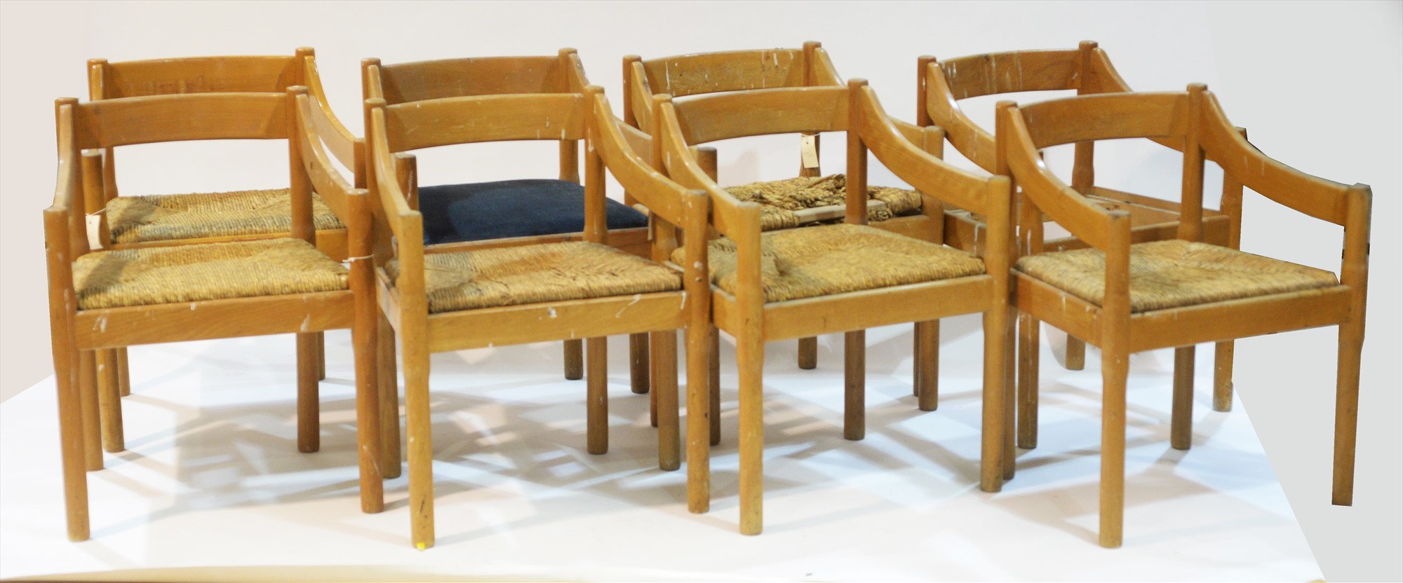 Set of eight rush seat dining chairs.