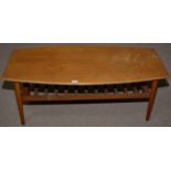 A mid 20th Century teak and beech coffee table.