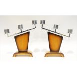 Pair of stained mahogany and chromed candlesticks