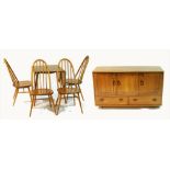 An Ercol six piece dining suite