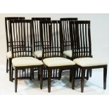 Six dining chairs by Harveys.