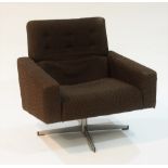 A mid 20th Century swivel armchair.