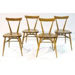 Four Ercol stacking chairs.