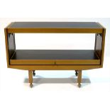 Metamorphic serving trolley.