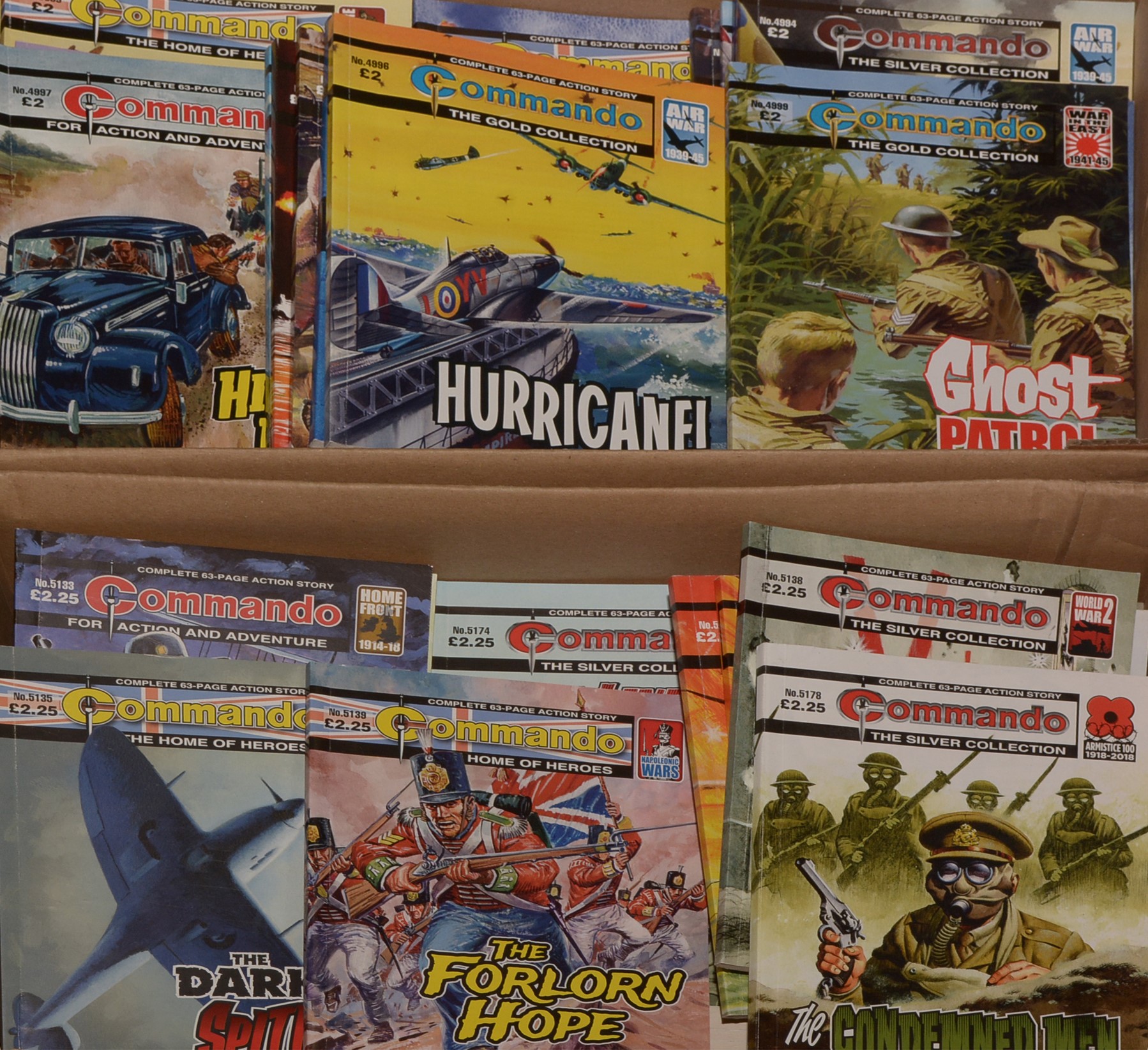 A large quantity of Commando comics.