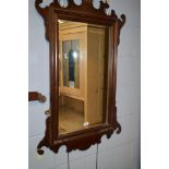Rectangular bevelled wall mirror.