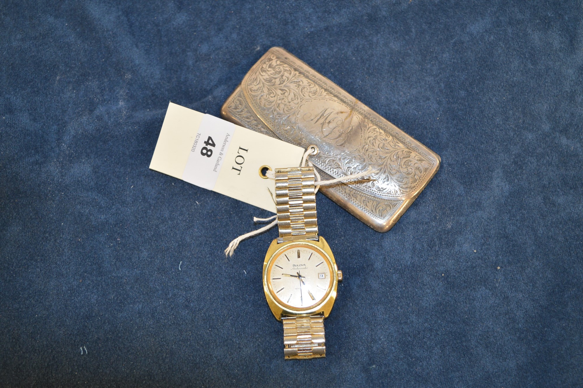 Bulova watch and silver glasses case