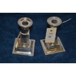 A pair of silver candlesticks