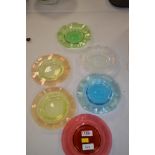Coloured glass dishes.