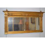 An early 19th Century rectangular overmantel mirror, with flared cornice over decorative moulded