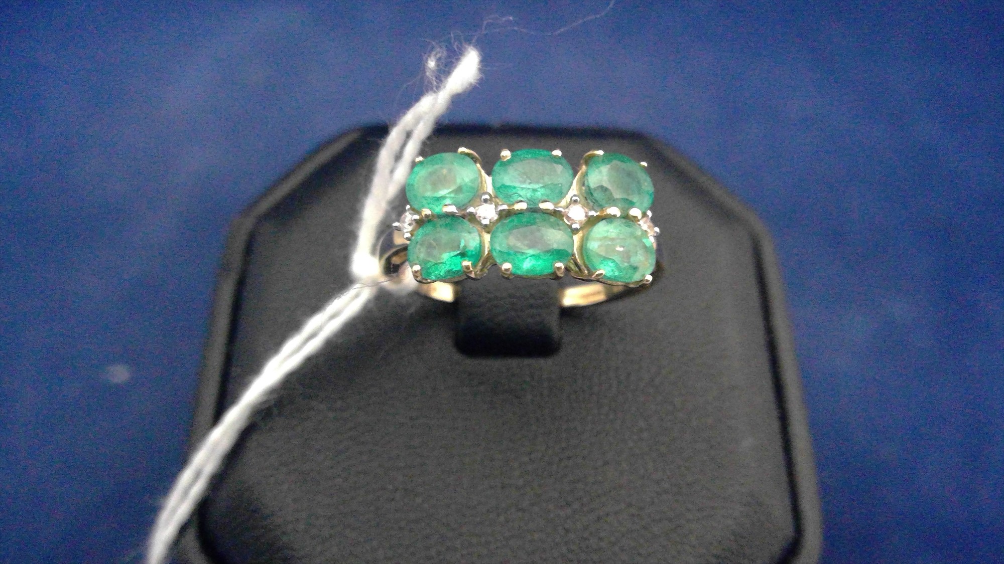 Emerald and diamond ring