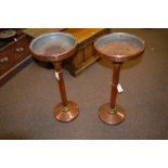 Pair of brass jardiniere stands.