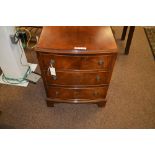 Small bowfront chest of drawers.