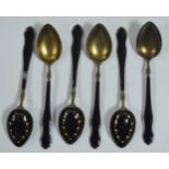 Six silver and enamel teaspoons