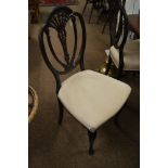 Set of four dining chairs.
