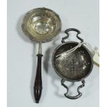 Two silver tea strainers