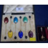 Silver and enamel coffee spoons and salt spoon