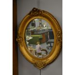 20th century gilt oval mirror