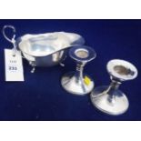 Silver sauce boat and candlesticks