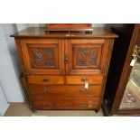 An Edwardian mahogany cupboard